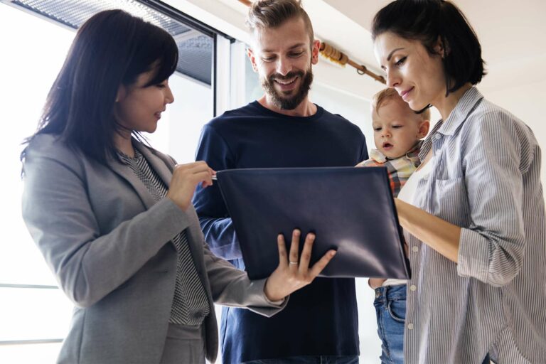Real estate agent and her clients